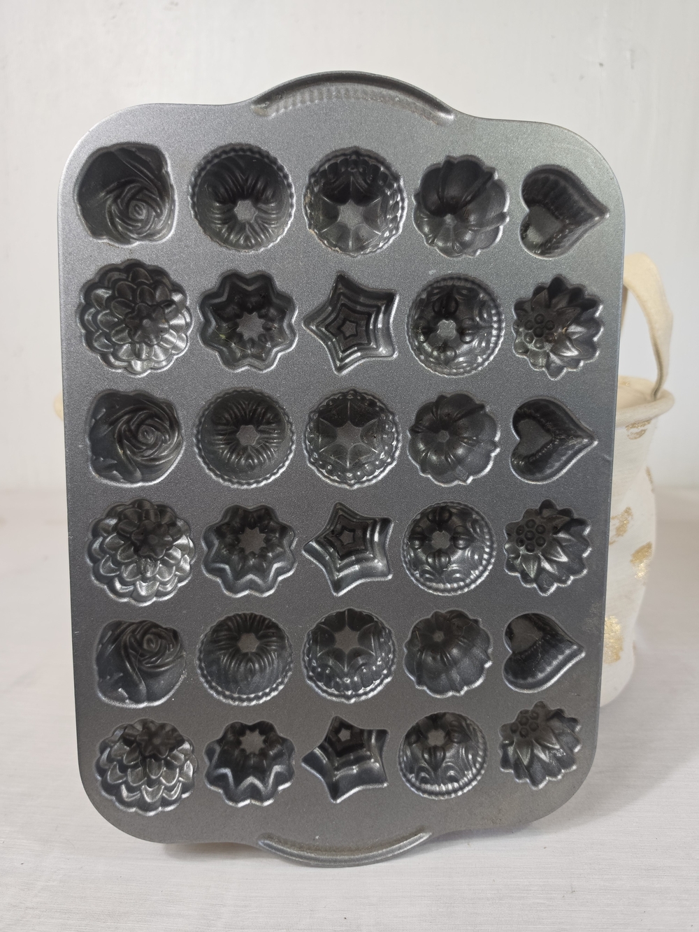 Nordic Ware Bundt Tea Cakes and Candies Pan, a cast aluminum baking mold